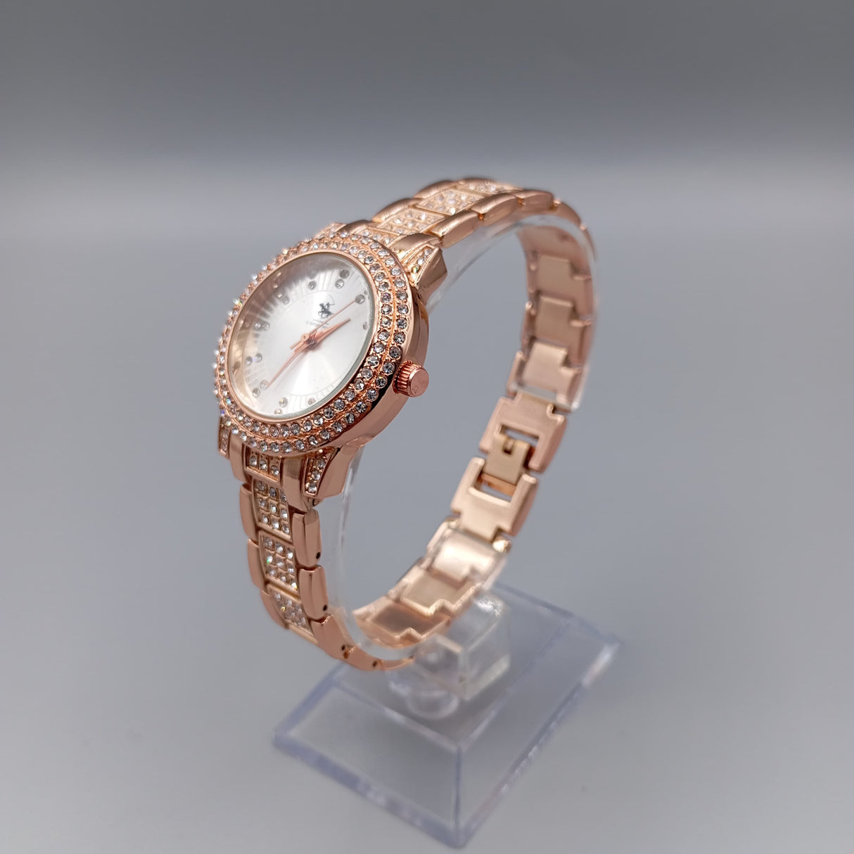 MONTRE POLO P0050 CUIVRE AUX STRASS. CAD DORE, INT ARGENTE.